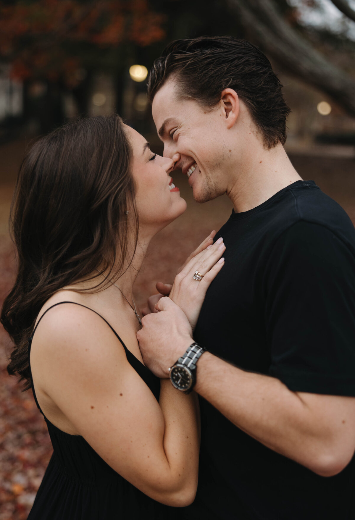 engaged couple kissing with their teeth in Homewood, al