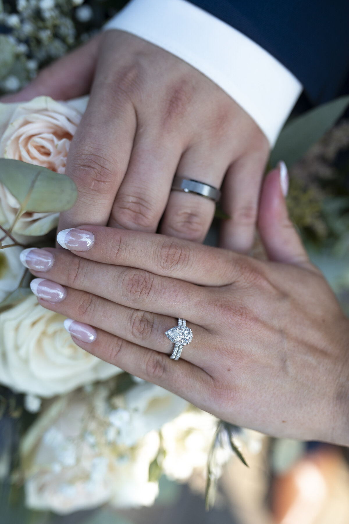Candid kiss between wedding couple
