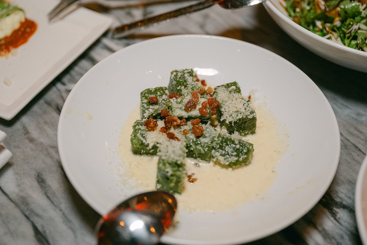 Fine dining salad course photographed at luxury catered reception in San Antonio venue