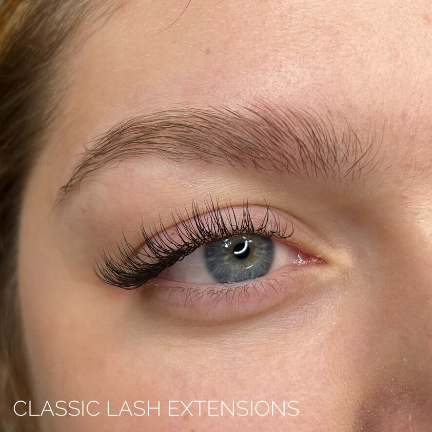 woman with blue eyes has lash extensions