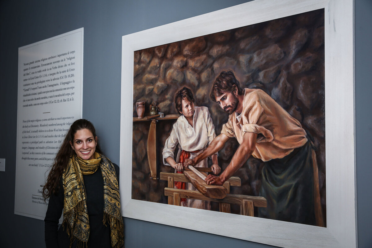 woman smiling with painting