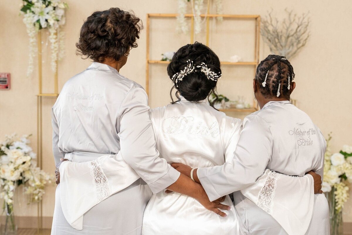 bride-with-mother-and-matron-in-robes-duneland-falls