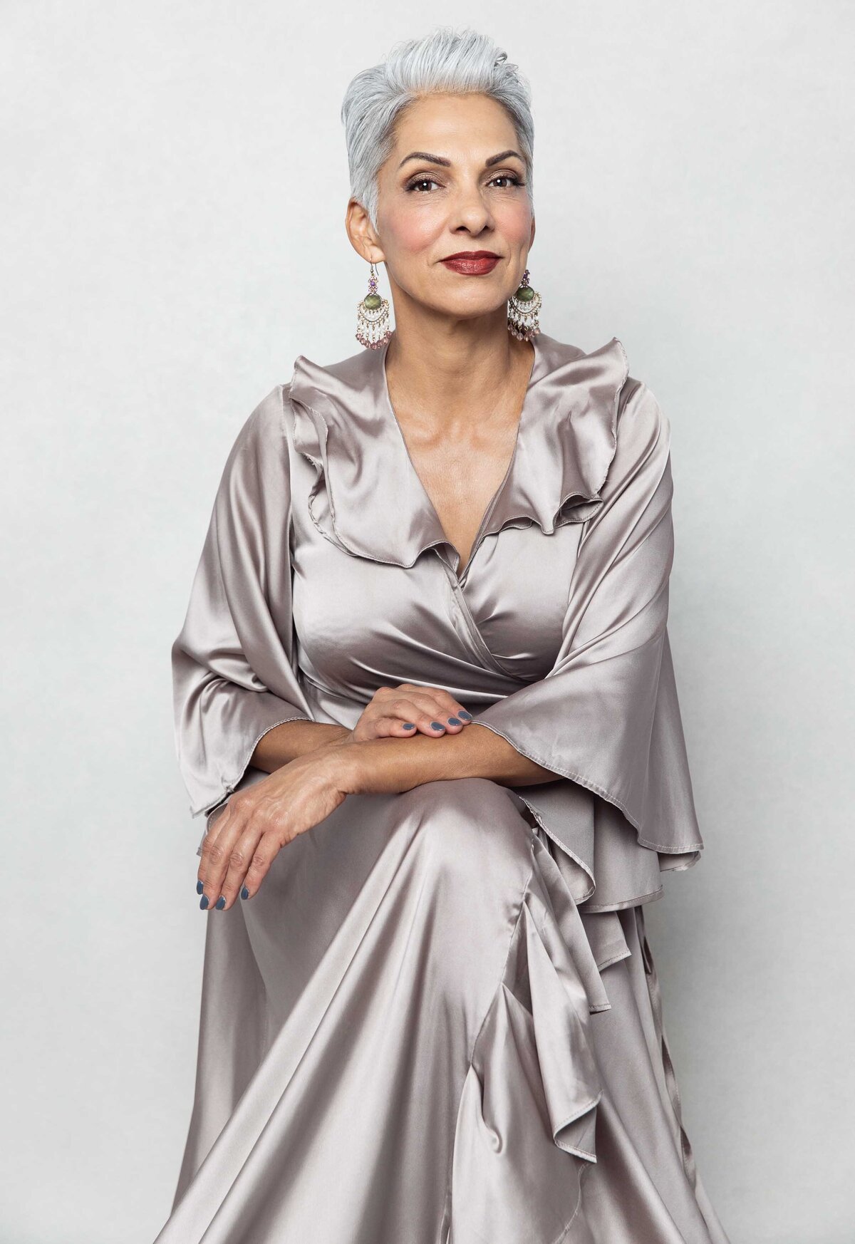 woman-portrait-in-silver-dress-with-earrings-marin