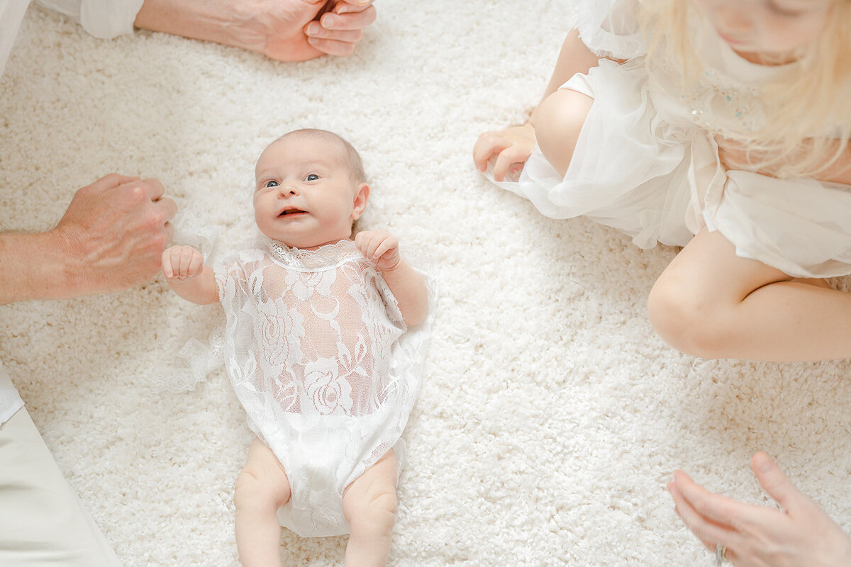 baby girl adored by all during Chantilly, Virginia newborn picture