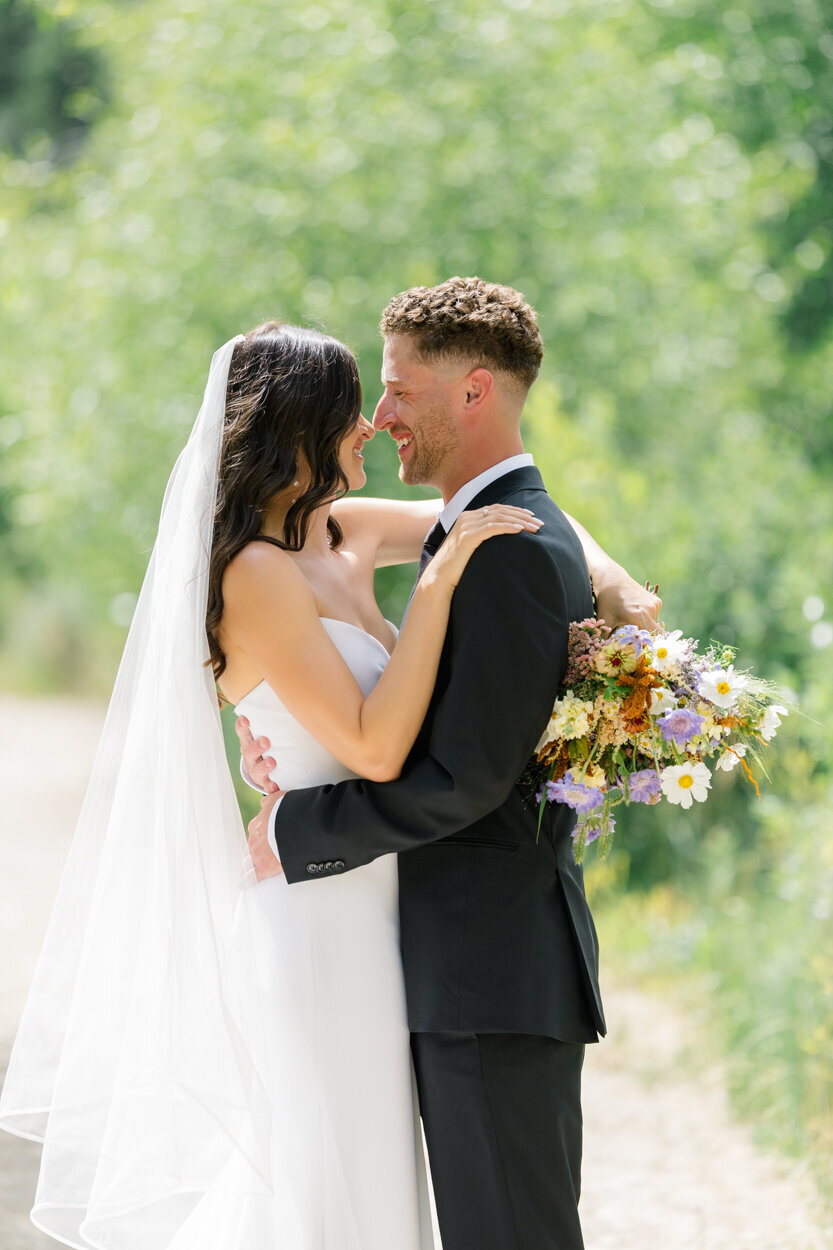 bride and groom nose to nose