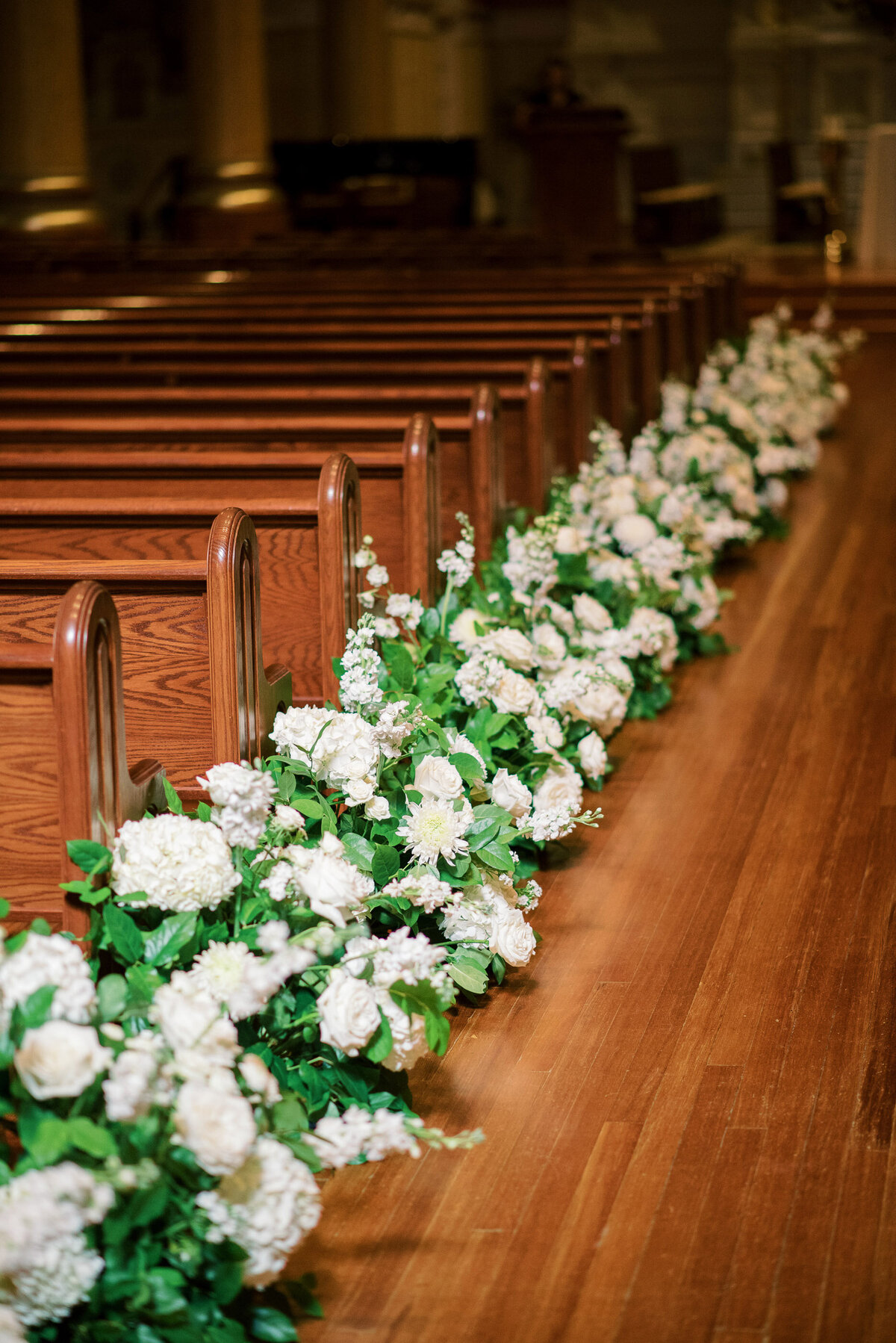 Kate-Murtaugh-Events-Boston-wedding-planner-rose-ceremony-aisle-flowers-Catholic-church