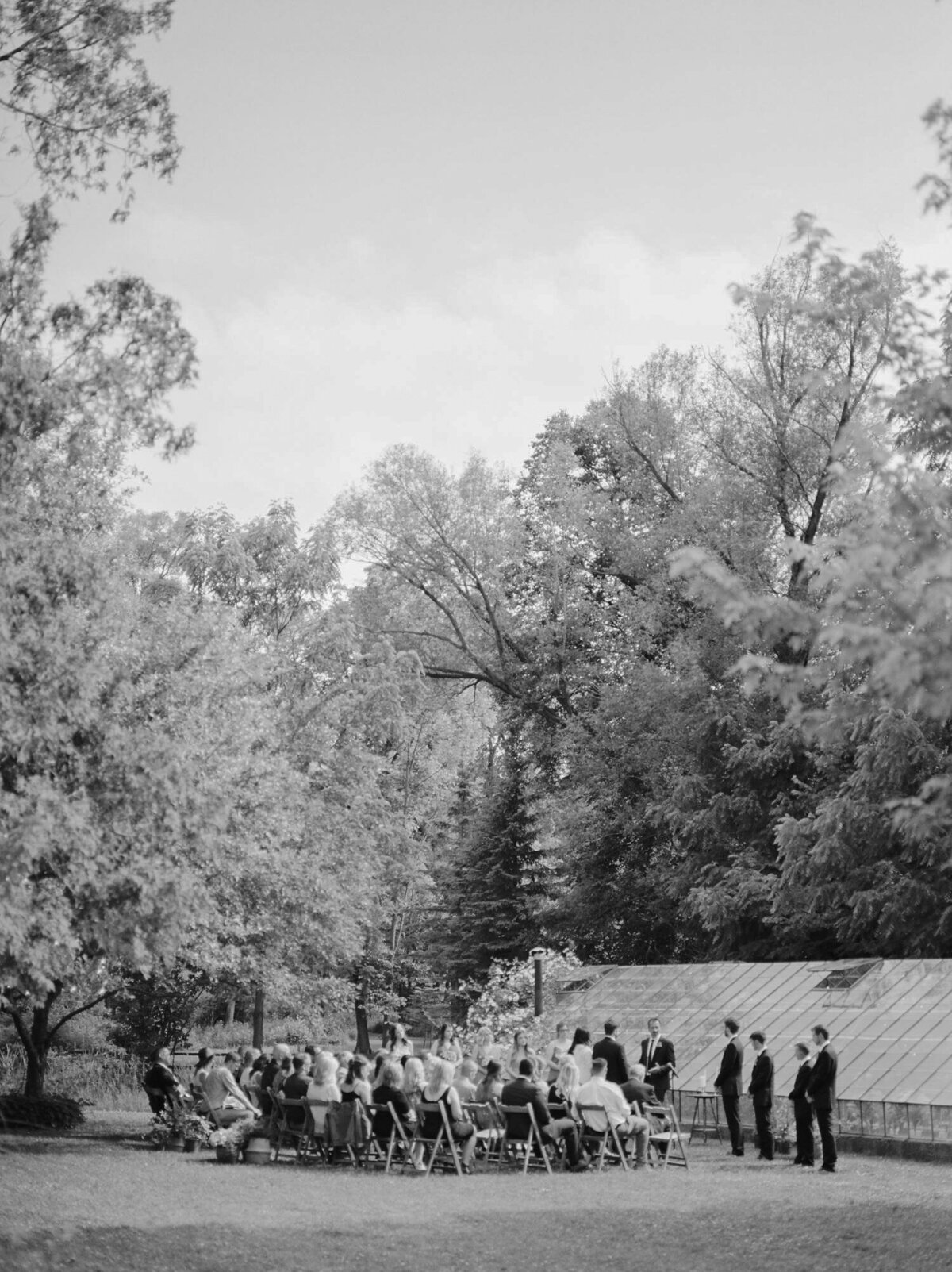 wedding ceremony, natural wedding photography at greenhouse wedding in michigan