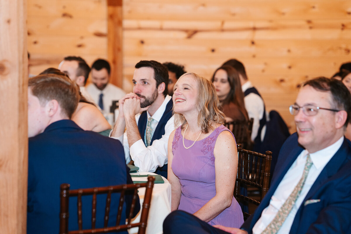 Reception decor featuring rustic charm and romantic candlelight