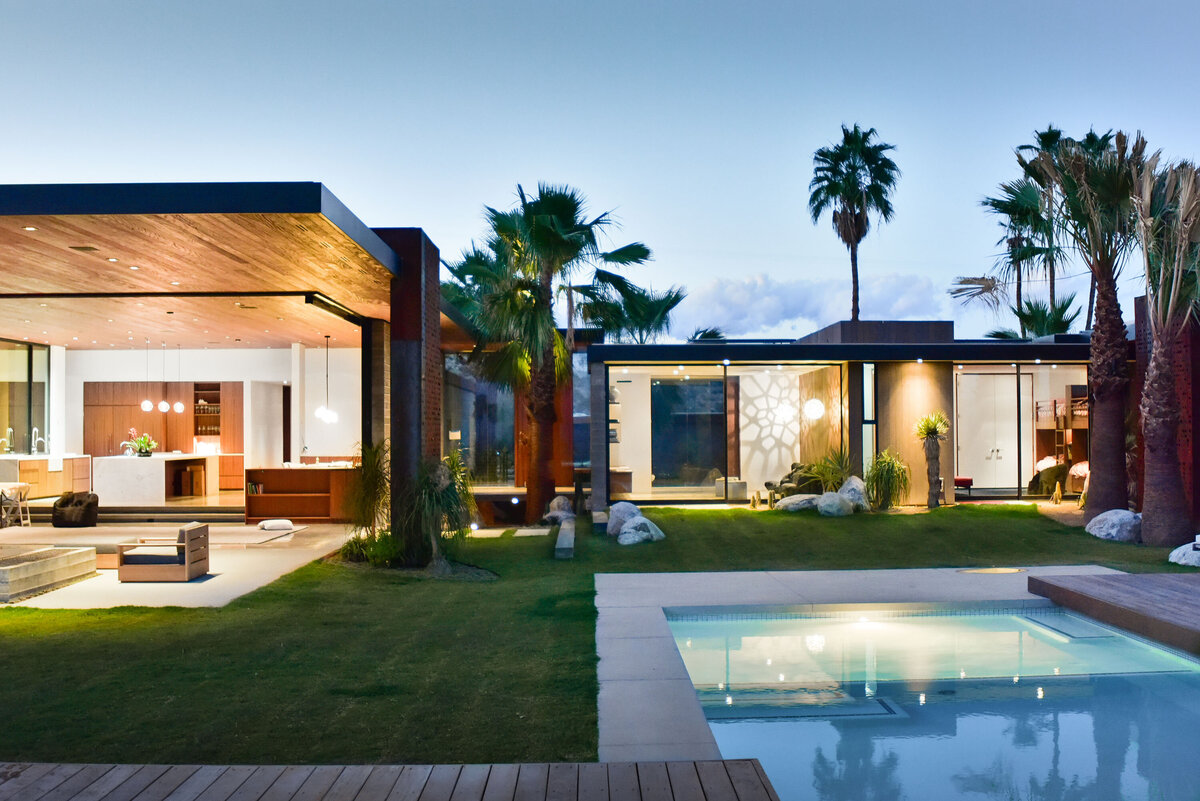 Linear roof lines and expansive glass views of modern high-end home designed by Palm Springs architect