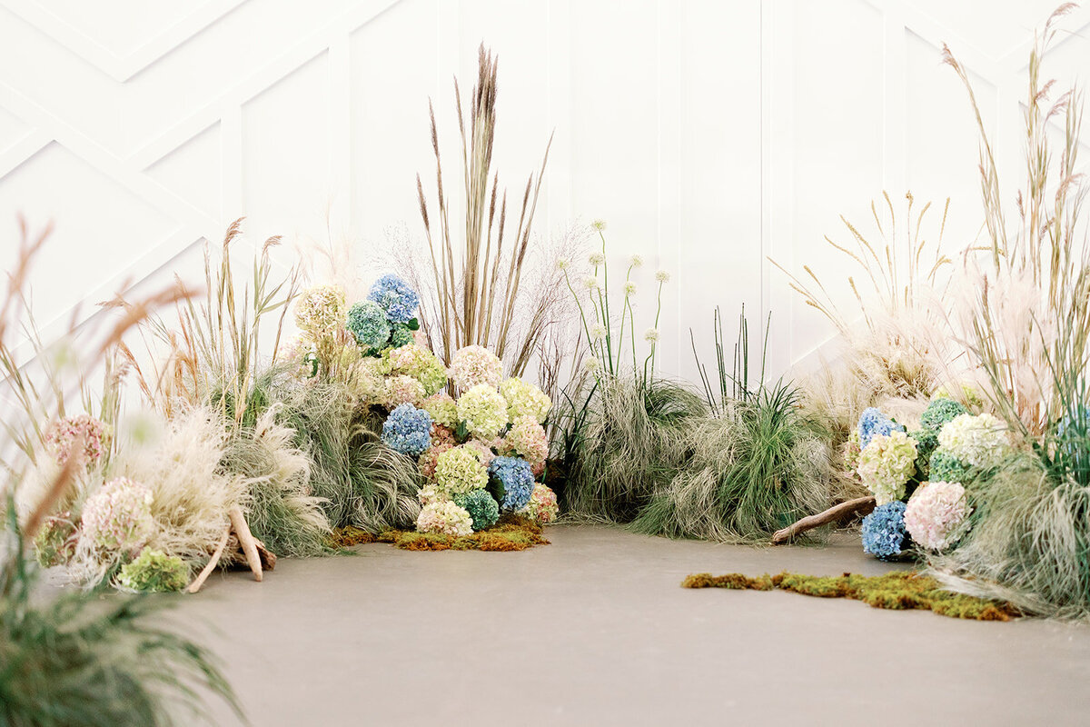 grass floral backdrop installation, studio fleurette