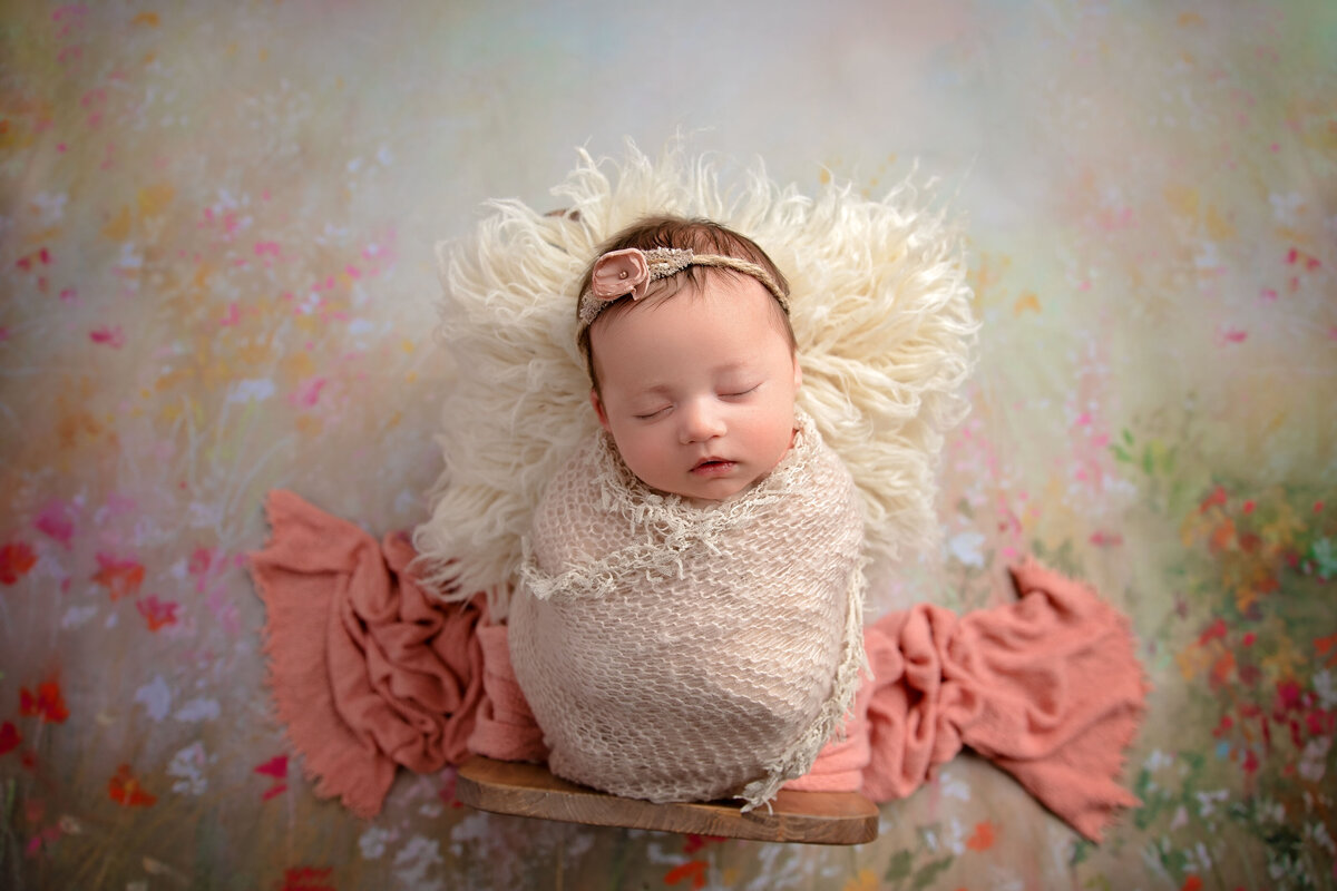 Experience timeless newborn studio photography in Phoenix, AZ. We capture every delicate feature and precious moment of your little one.