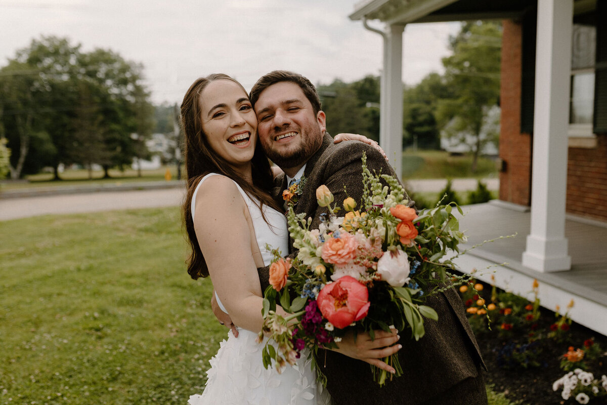 bride and groom smiling