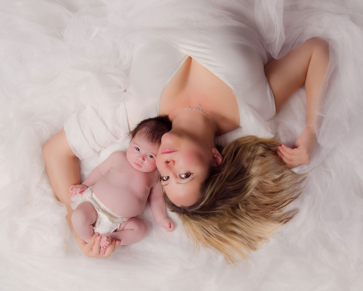 Tally S Photography Family photography newborn and mother on white tulle