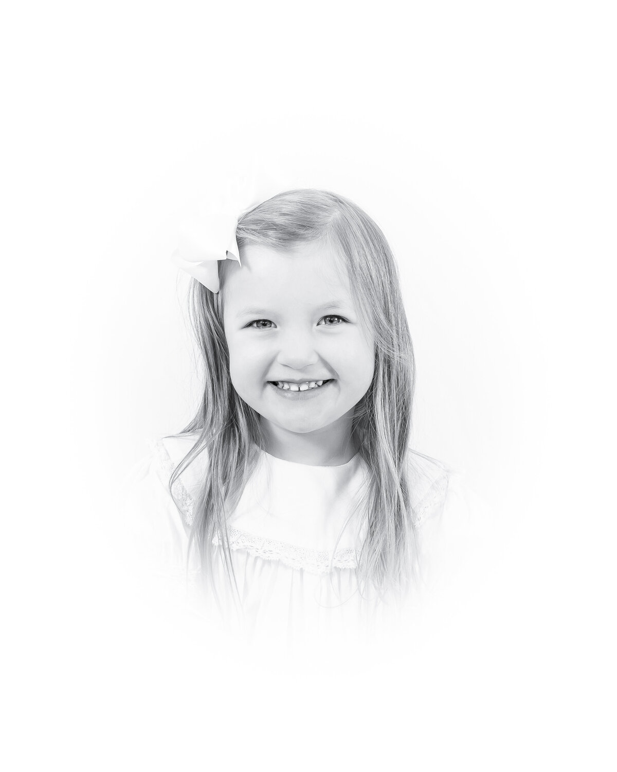 Black and white heirloom portrait of a smiling baby dressed in a classic white outfit with lace details. This timeless baby photography captures the innocence and joy of childhood, created by a Birmingham newborn photographer specializing in elegant, light-filled portraits.