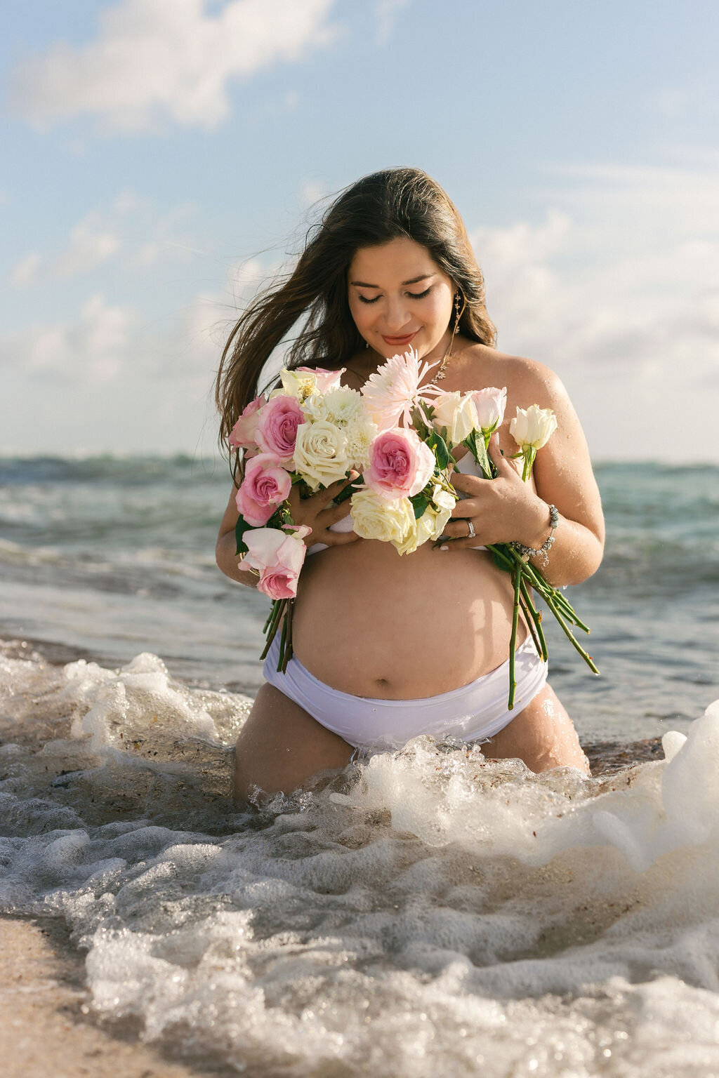 maternity-session-miami-beach-flower-bouquet-in-ocean-waves-sunrise