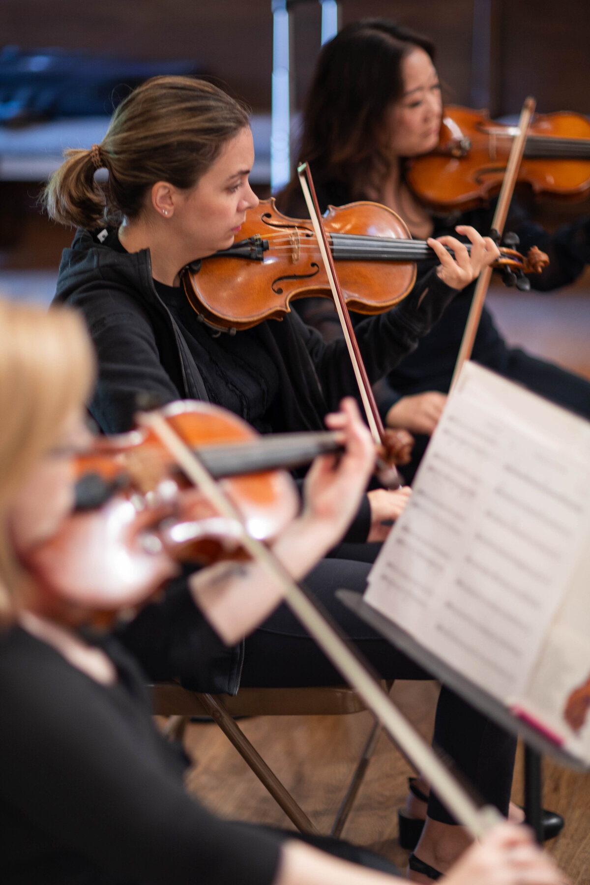 musicians playing violin