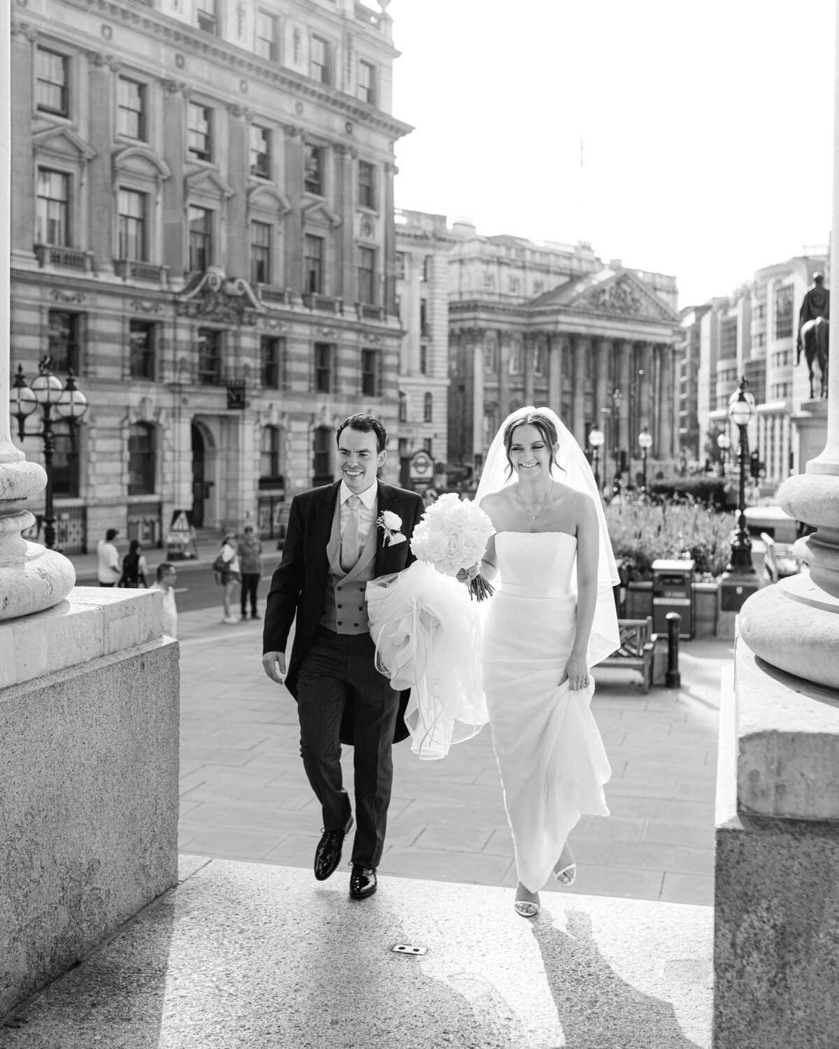 Bride and groom arriving for wedding reception at The Royal Exchange