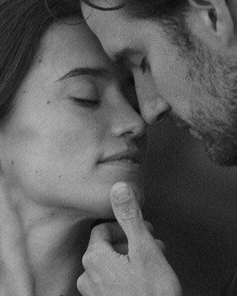 Romantic close up of couple at santa barbara beach during engagement session 