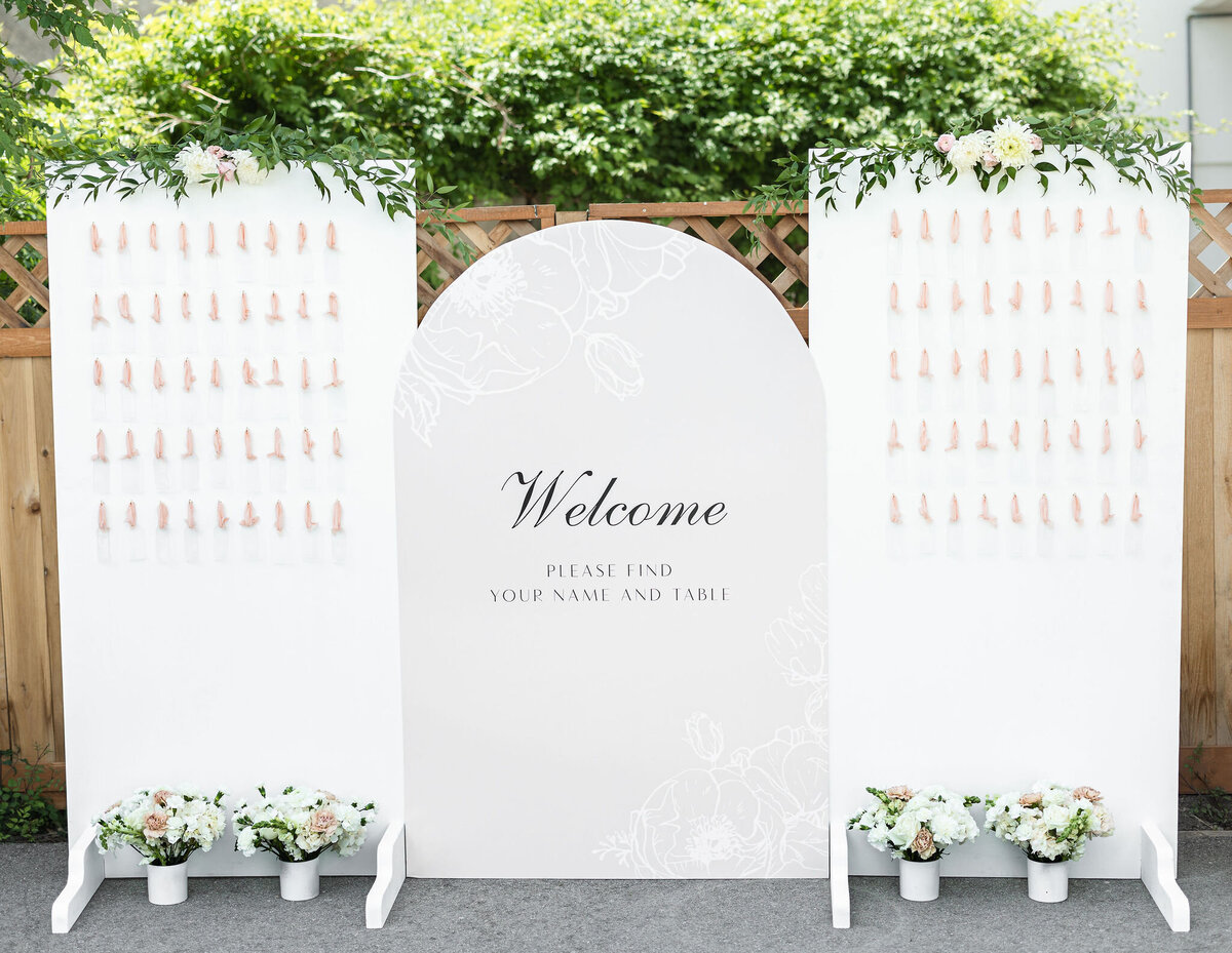 Oversized seating chart with interactive and custom key chain elements for each guest.
