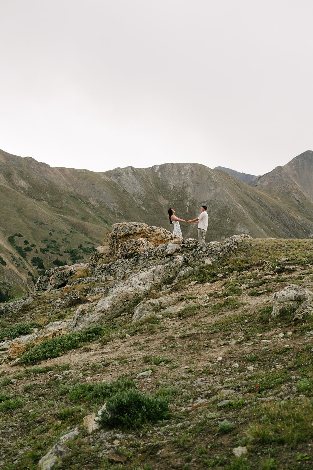 Denver engagement photographer capturing couple hiking in the mountains