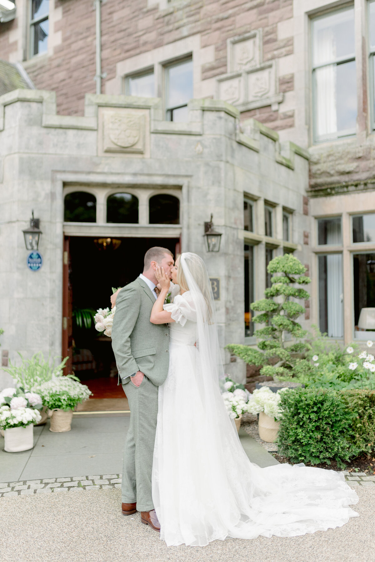 Bride and Groom in the grounds of Cromlix House, photographed by Scotland fine art wedding photographer.