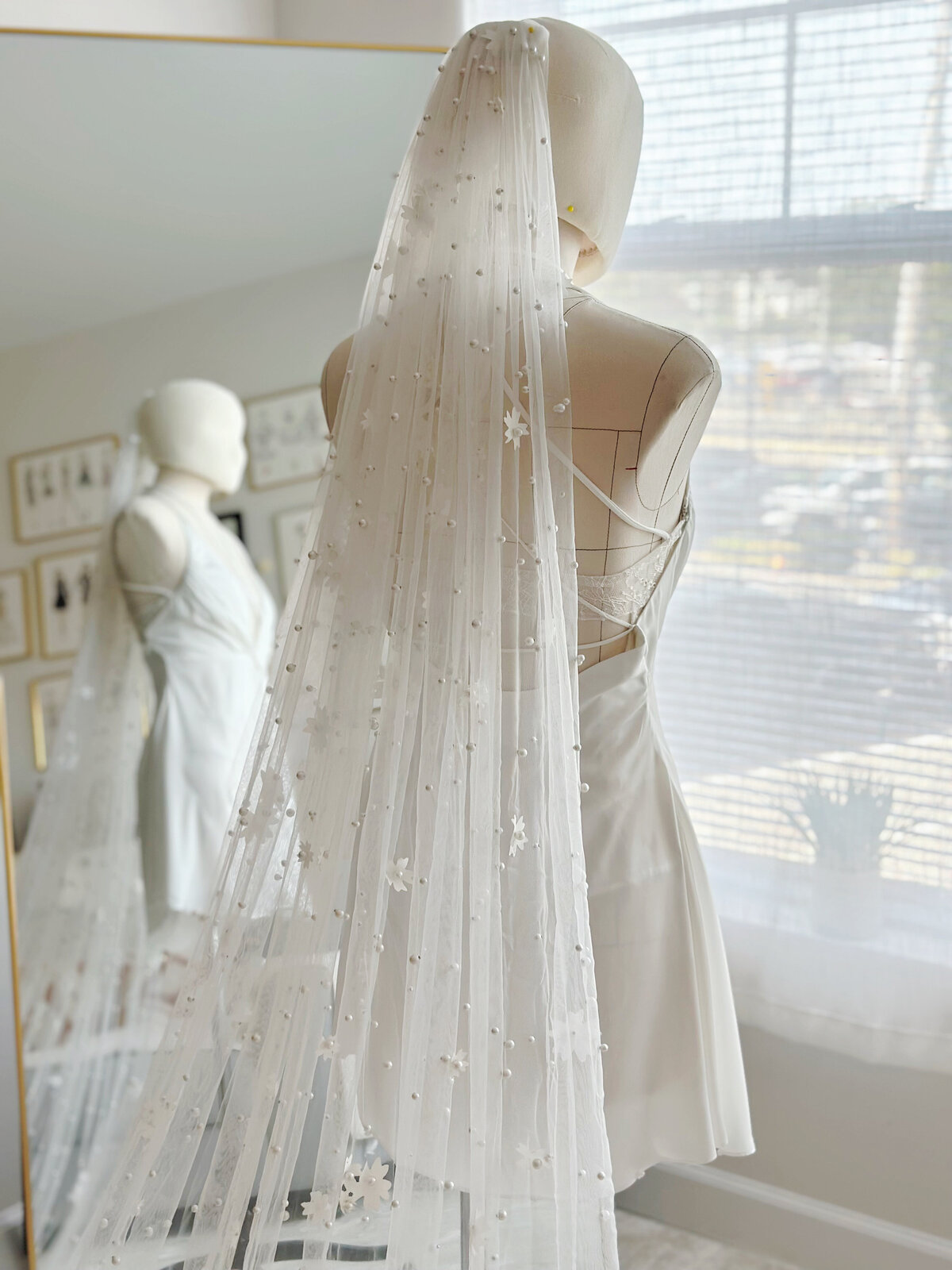 Airy bridal veil with beaded border and delicate craftsmanship
