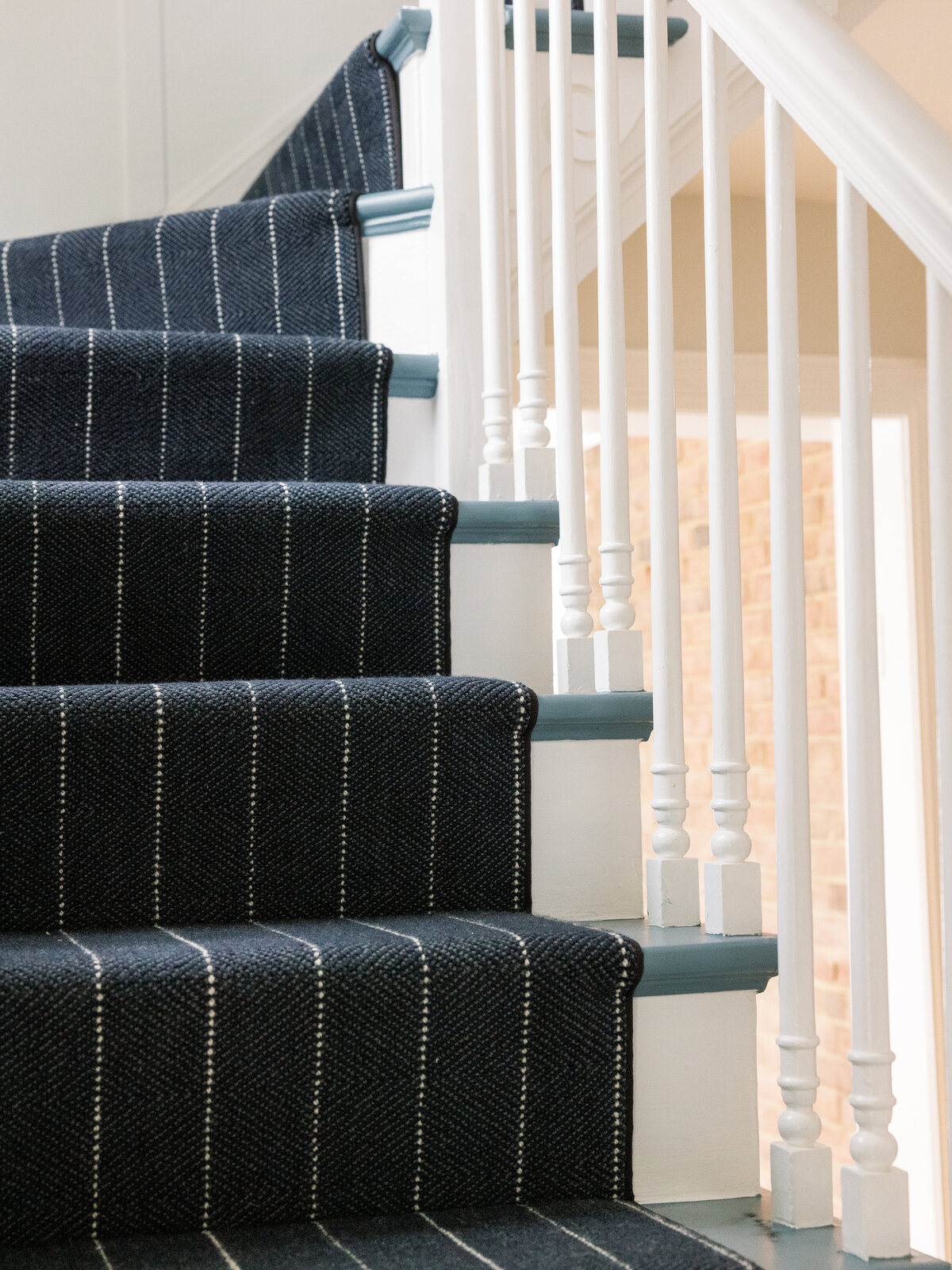 Navy blue stair runner with pin stripes