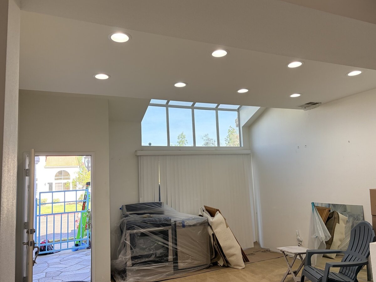 Bright living room after white interior wall and ceiling painting