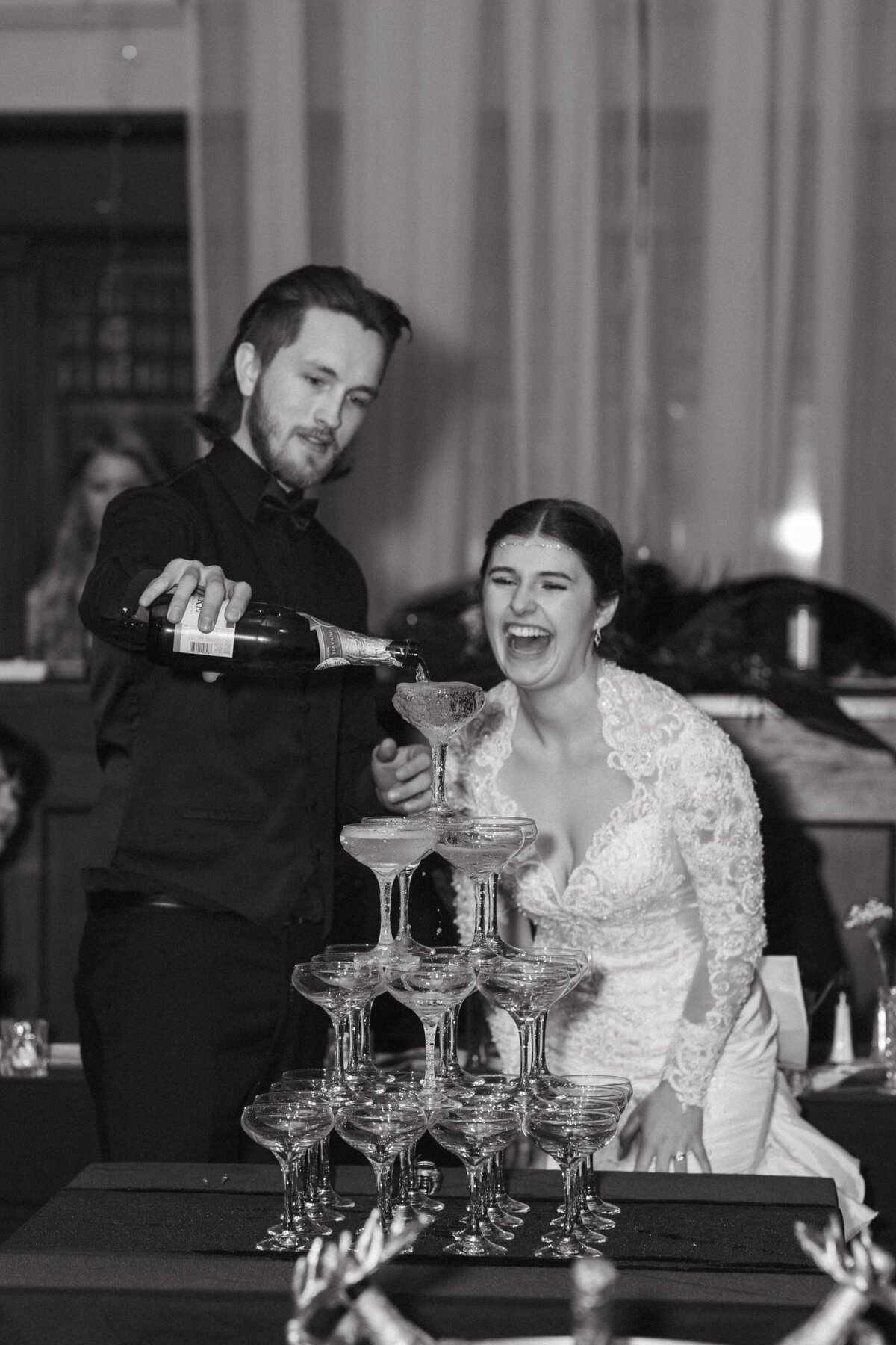 champagne tower pour at wedding