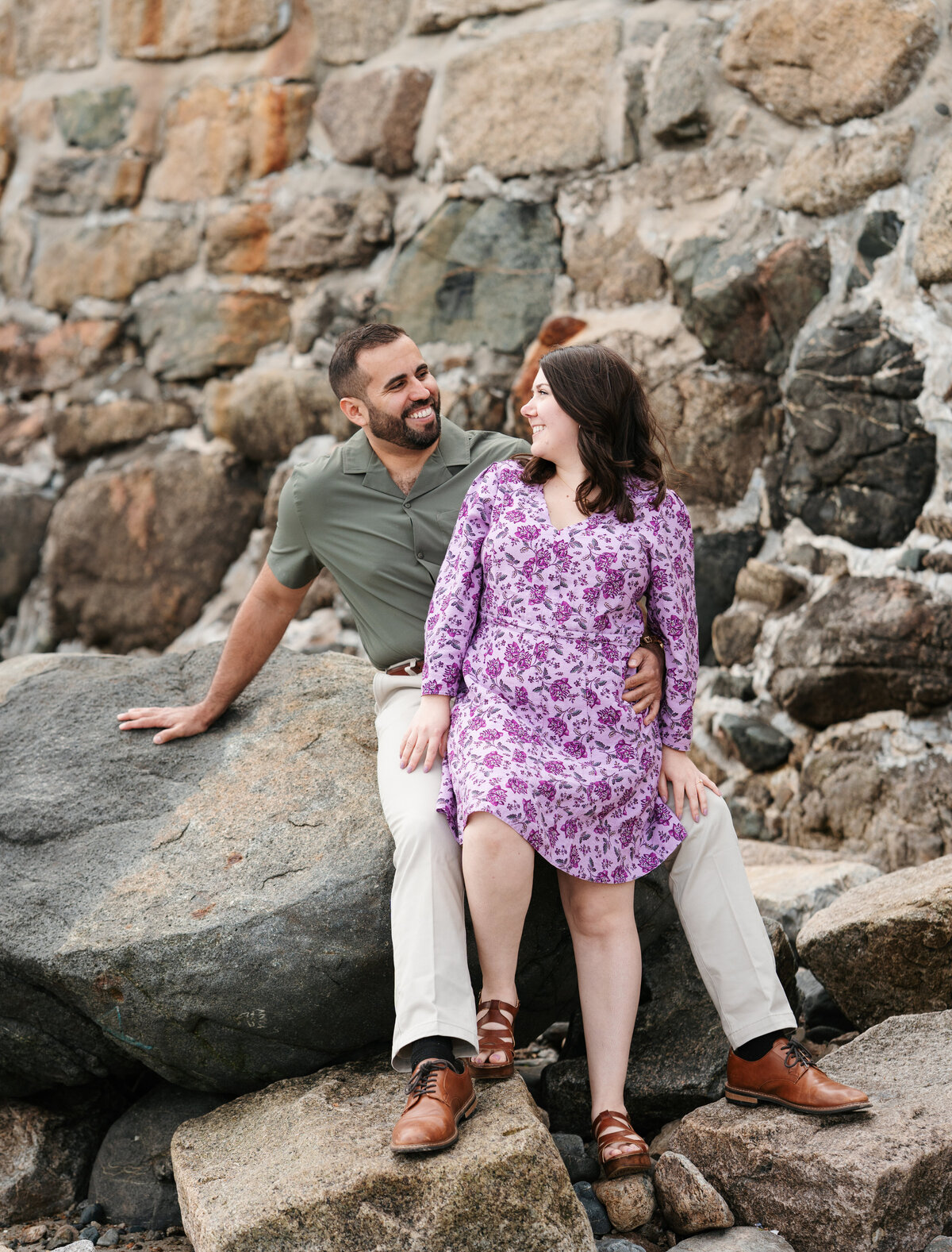 Couple walking through the rose garden at Lynch Park during their Beverly engagement session with Danielle Littles Photography