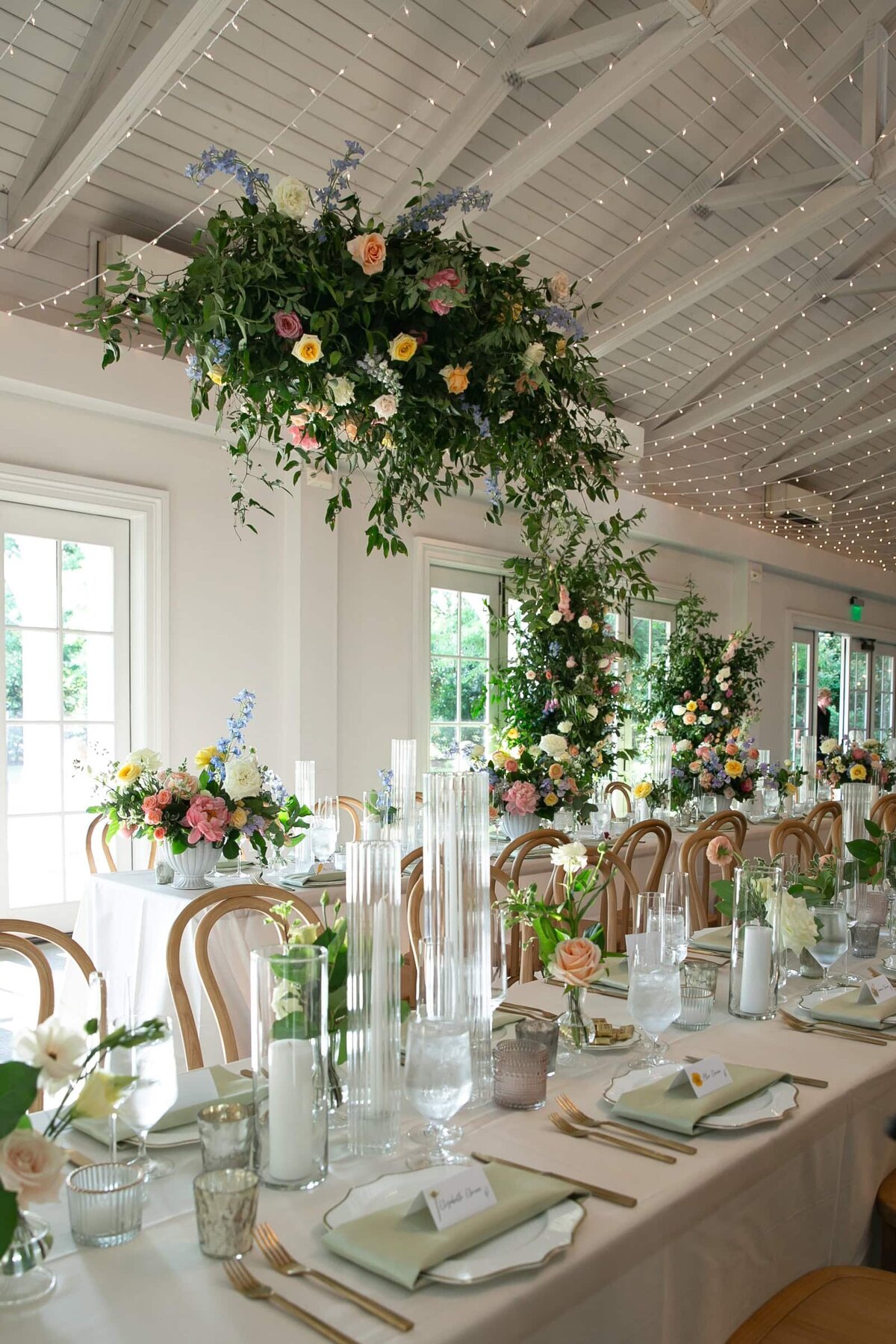 elaborate ceiling florals at a wedding reception in Raleigh.