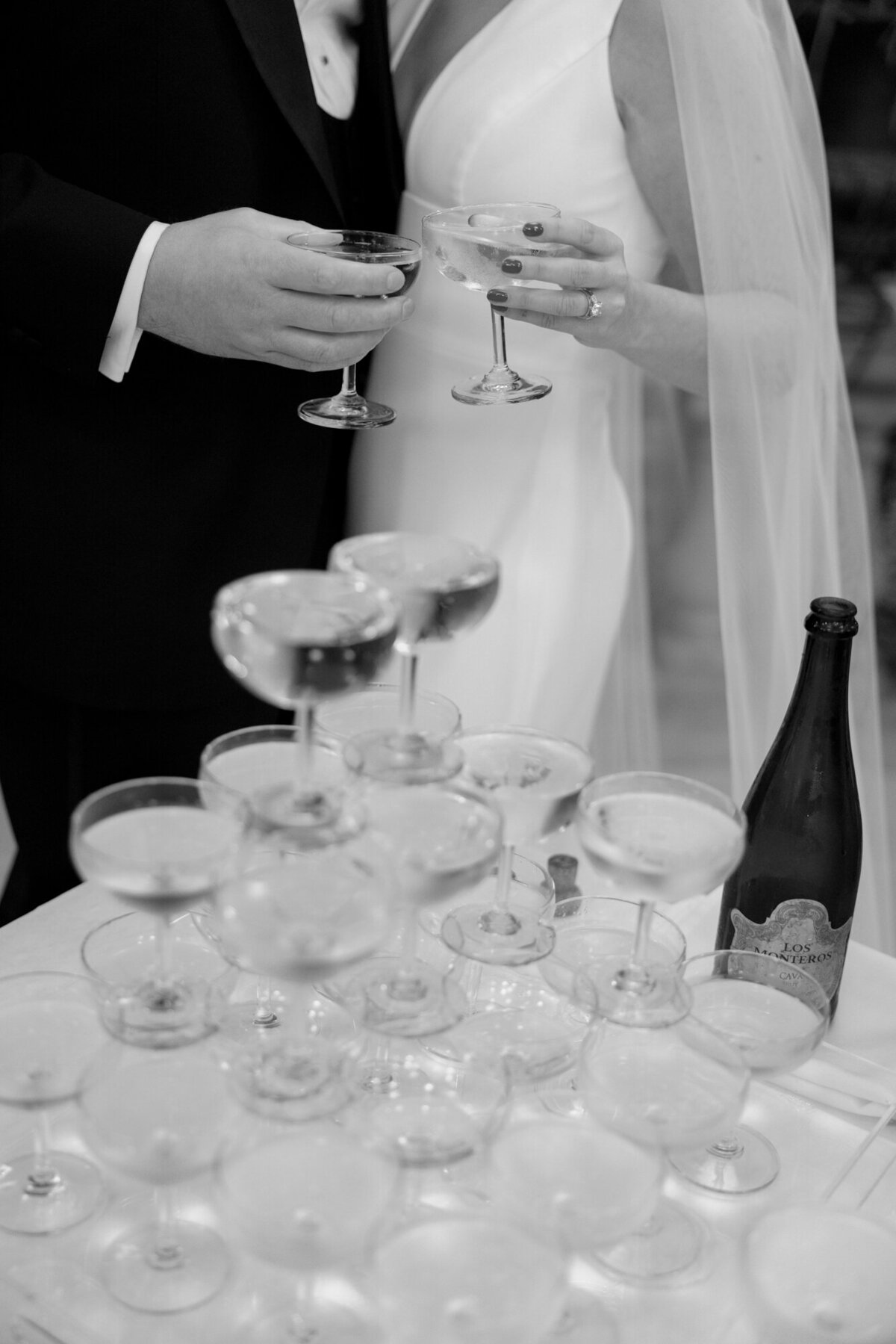 An editorial wedding photo of a champagne tower at Salvatore's in Chicago