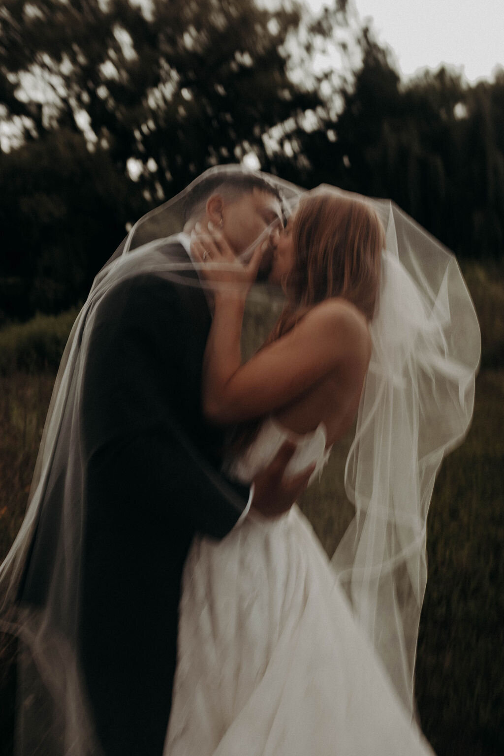 blurry bride and groom wedding photography