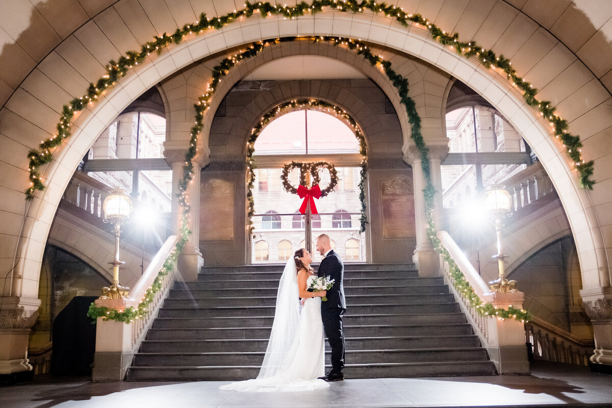 winter wedding on the staircase at the allegheny county courthouse
