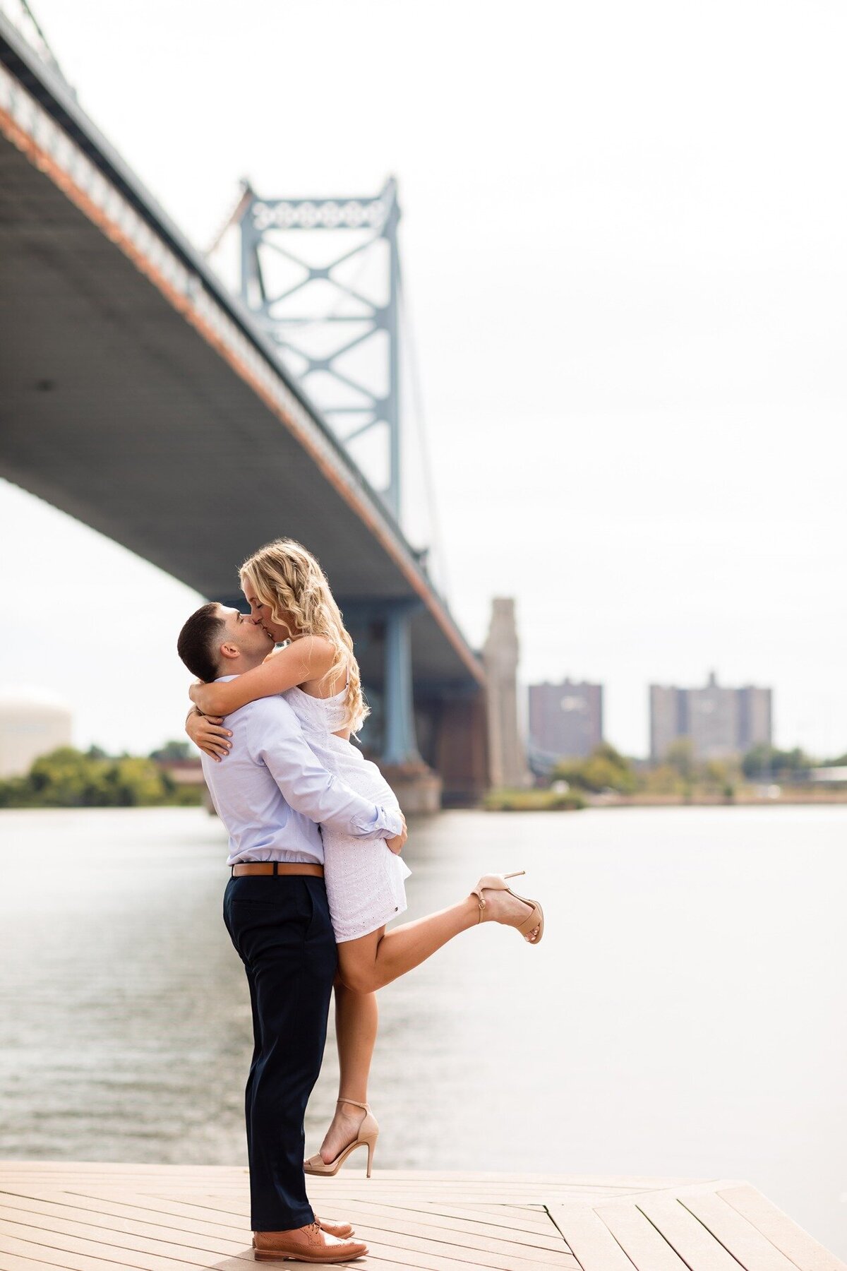 engaged-couple-race-street-pier