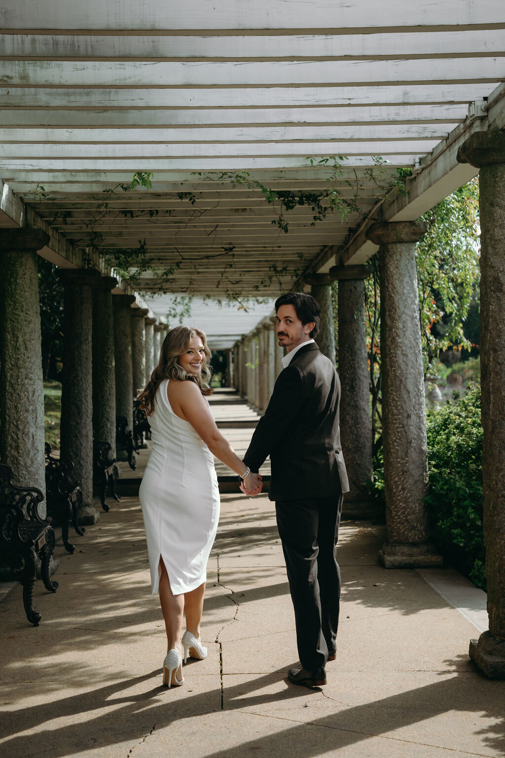 meredith-michel-photography-garden-archway-hand-in-hand-richmond-va