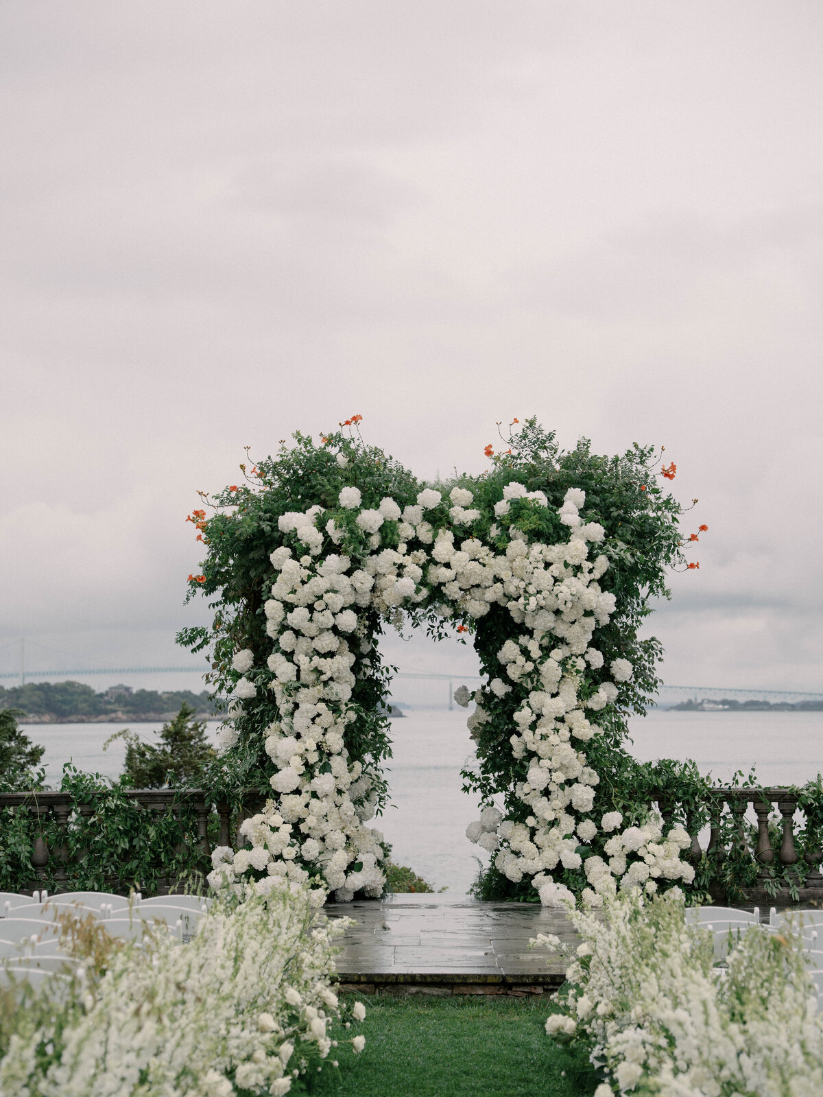 luxury-floral-wedding-arch-castle-hill-inn-ri