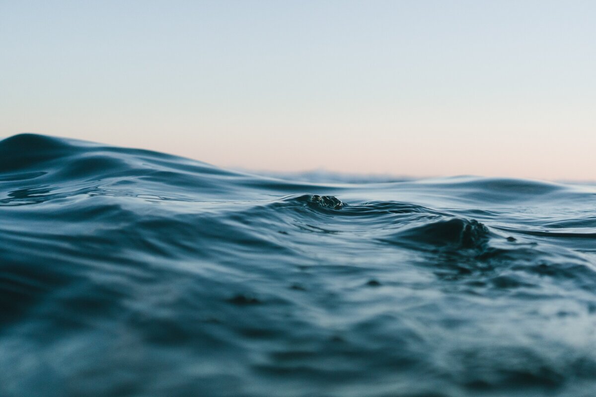 body-of-water-under-blue-and-white-skies-1533720