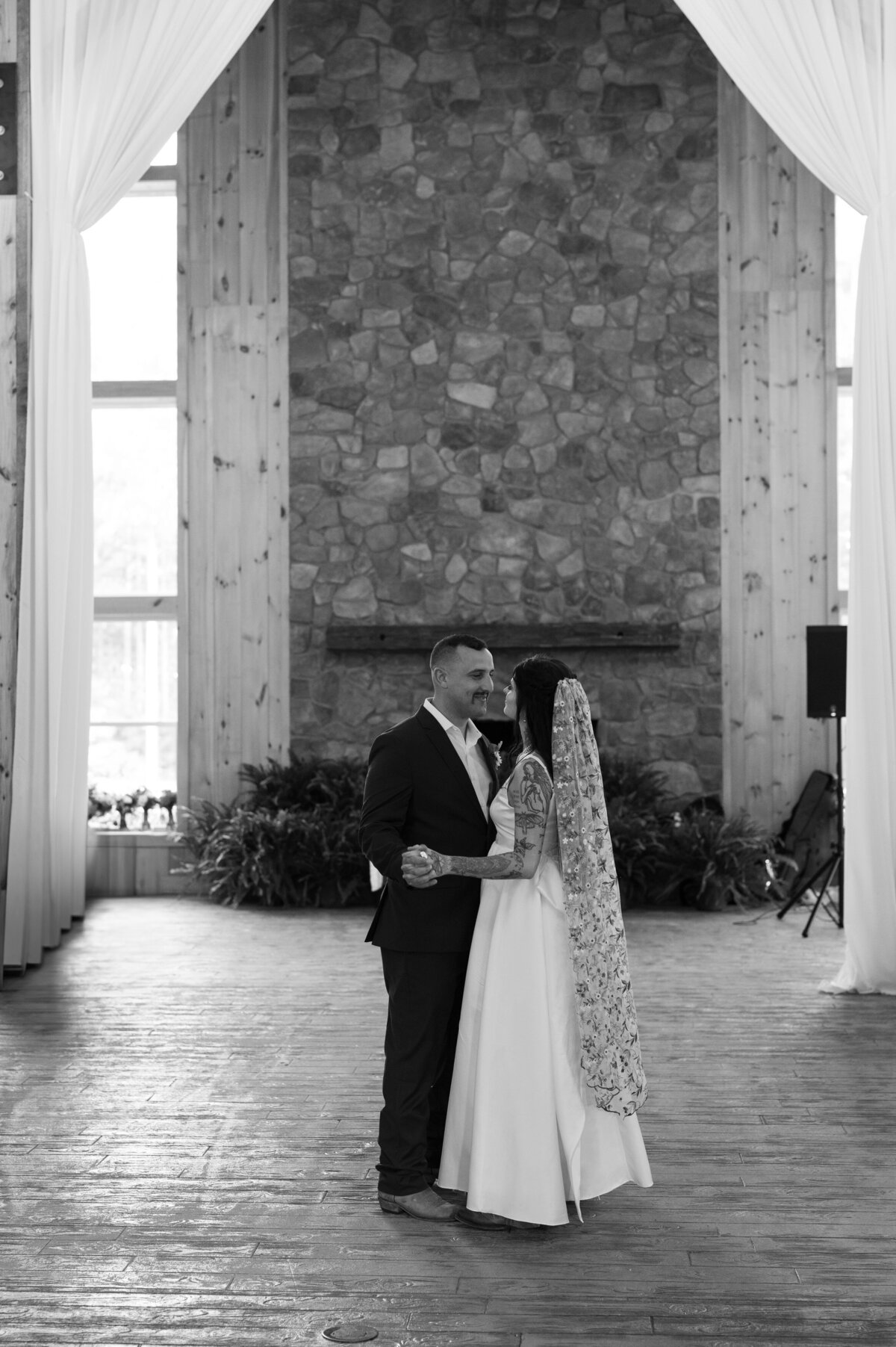 Newlyweds dancing at their wedding reception