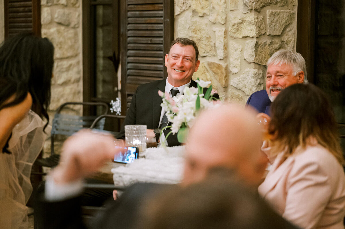 man-smiling-during-reception