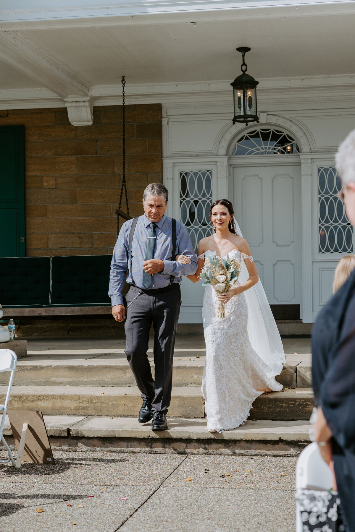 father walking a bride down the aisle