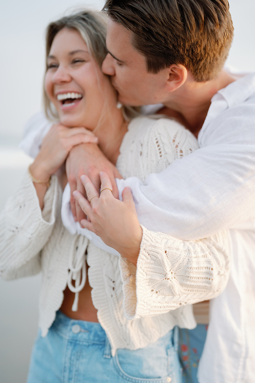 A couple hugging on the beach in NJ