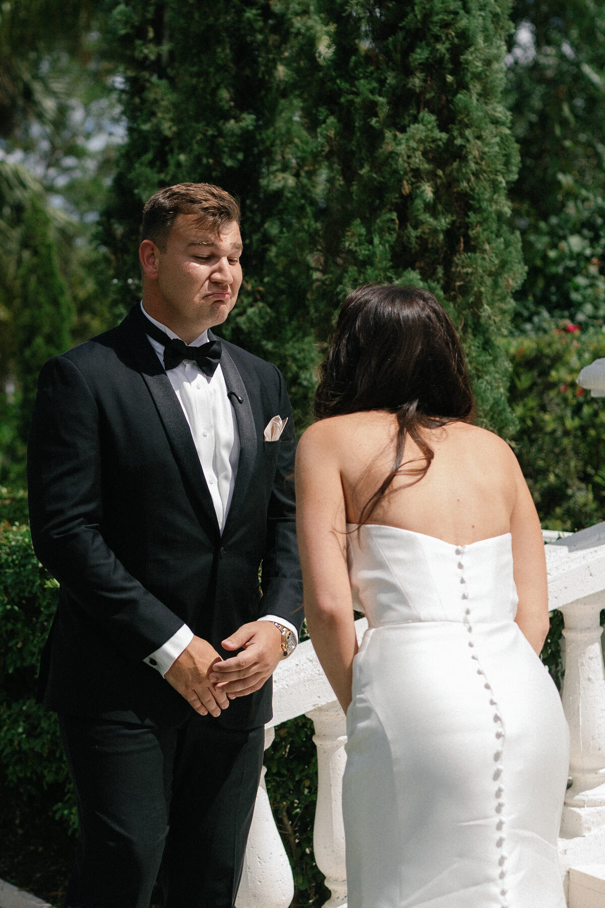 Emotional first look moment between bride and groom at La Casa Toscana