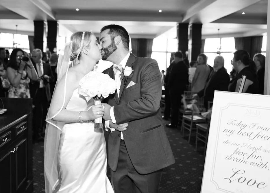 bride-groom-romantic-kiss-wedding-ceremony