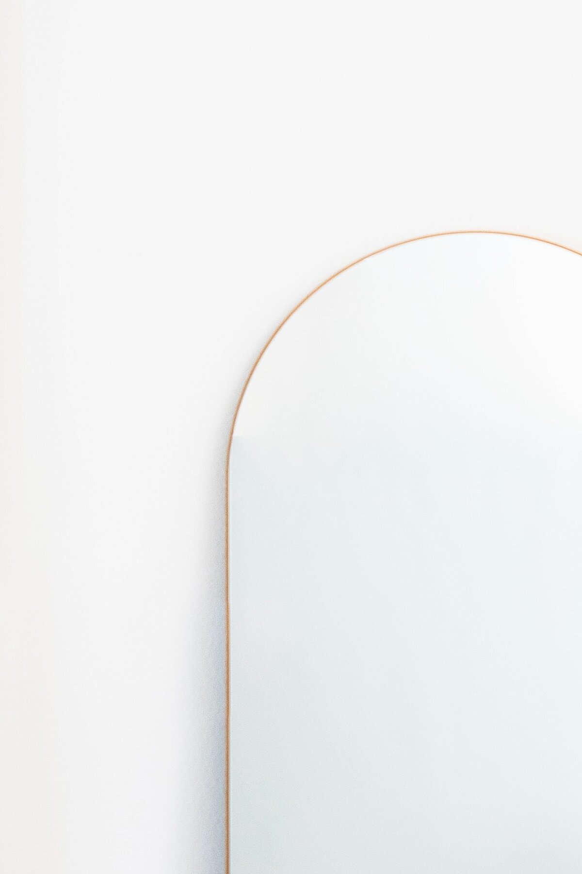 Large gold arch mirror with stand