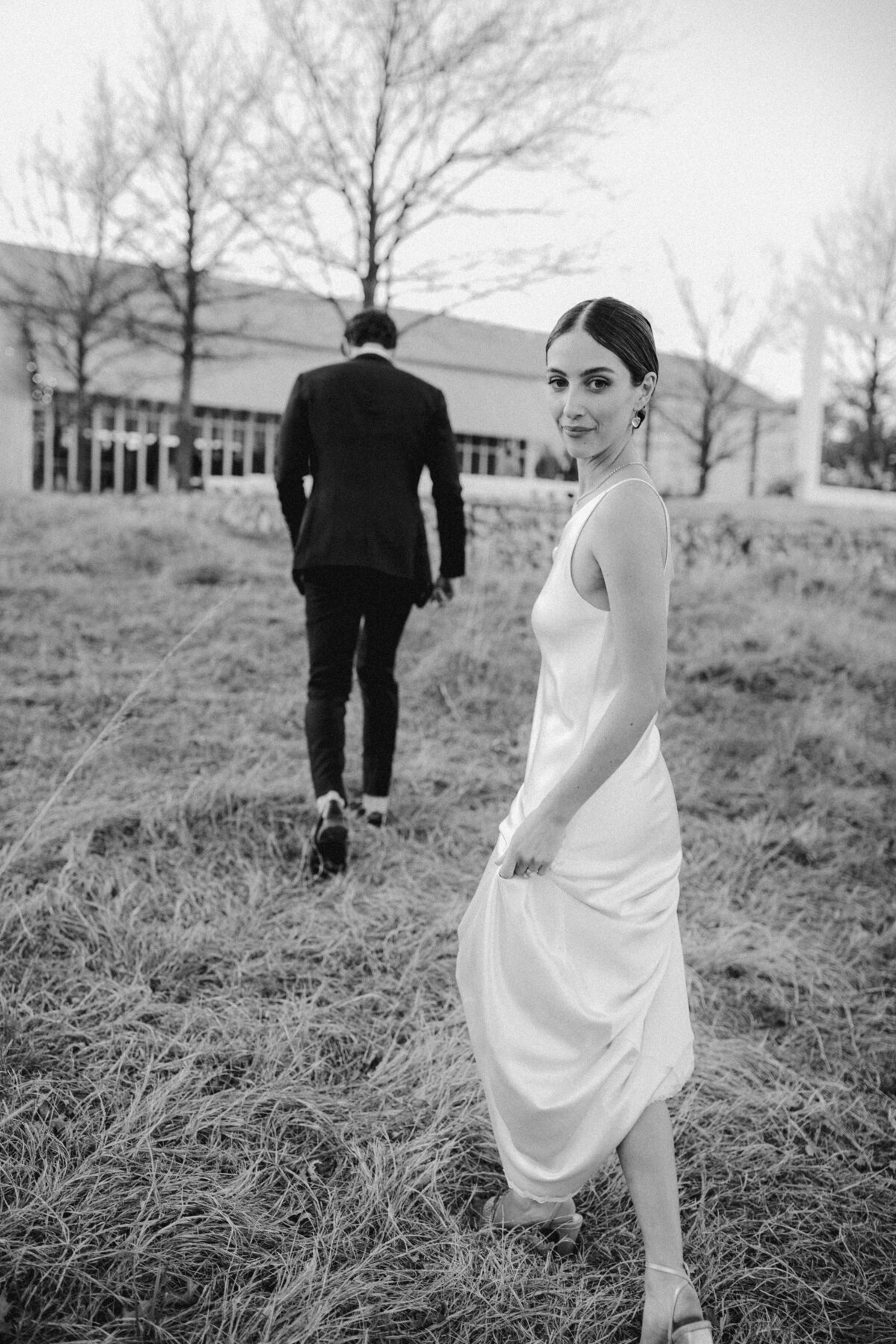 Bride and groom portraits in a field for Austin wedding