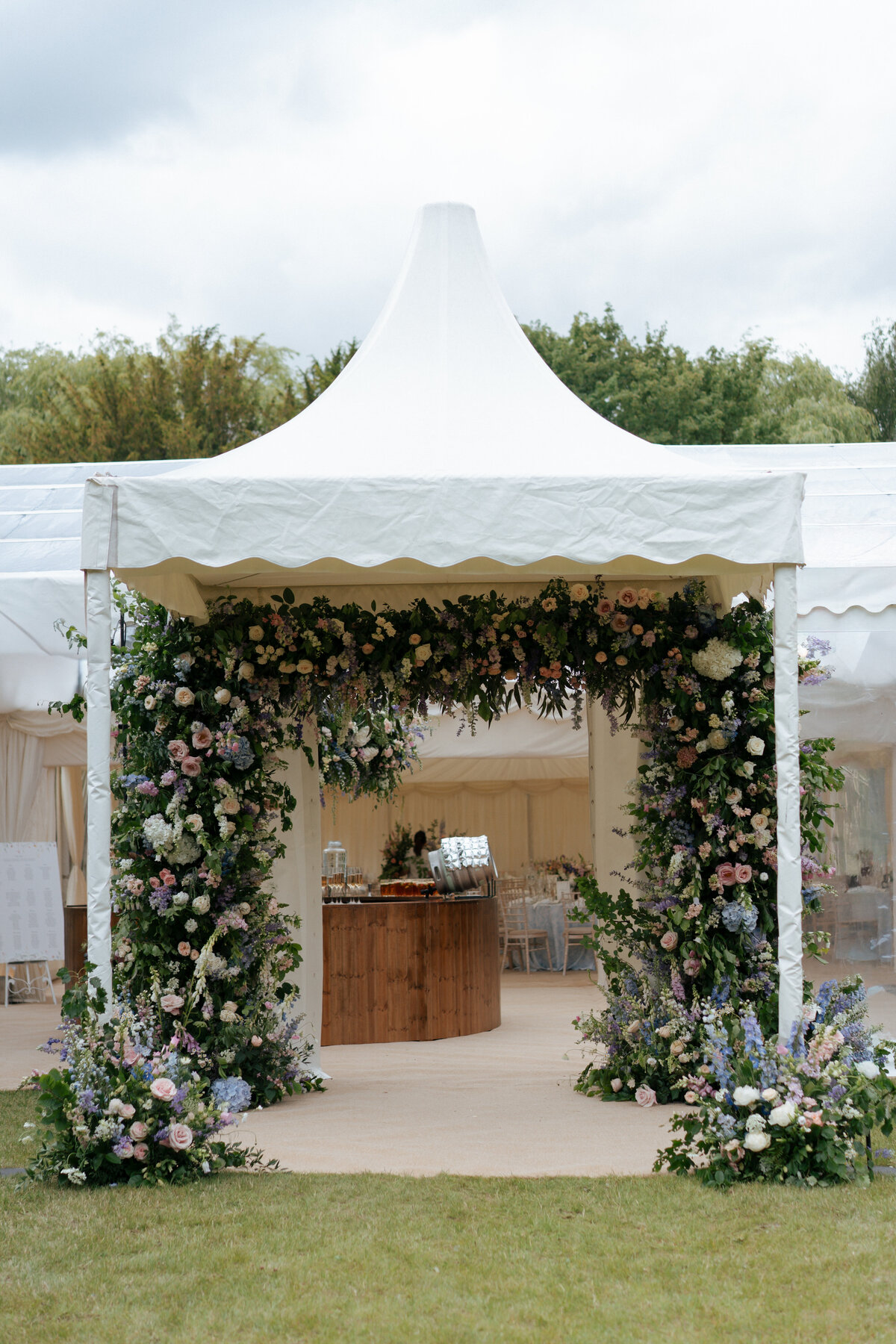 Marquee wedding natural organic floral and foliage arch