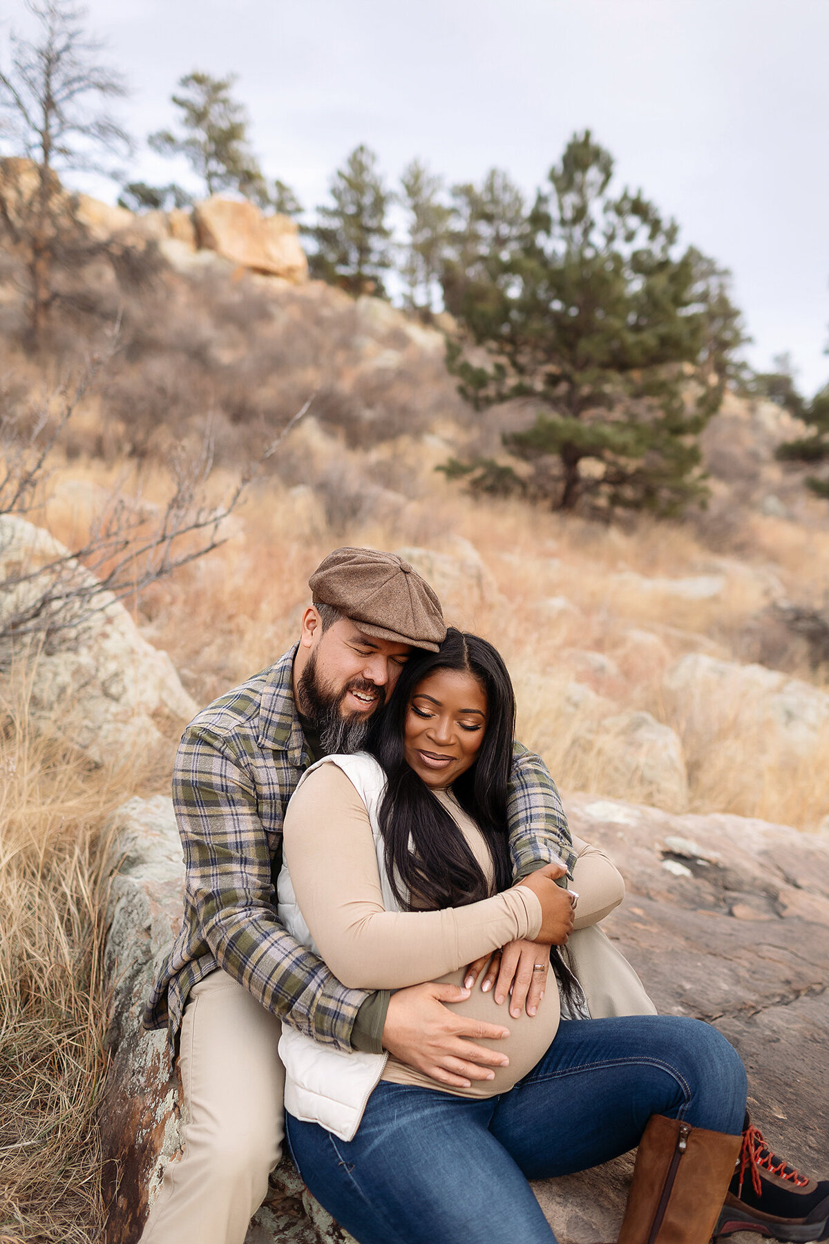 couple's maternity photos in the rocky mountains