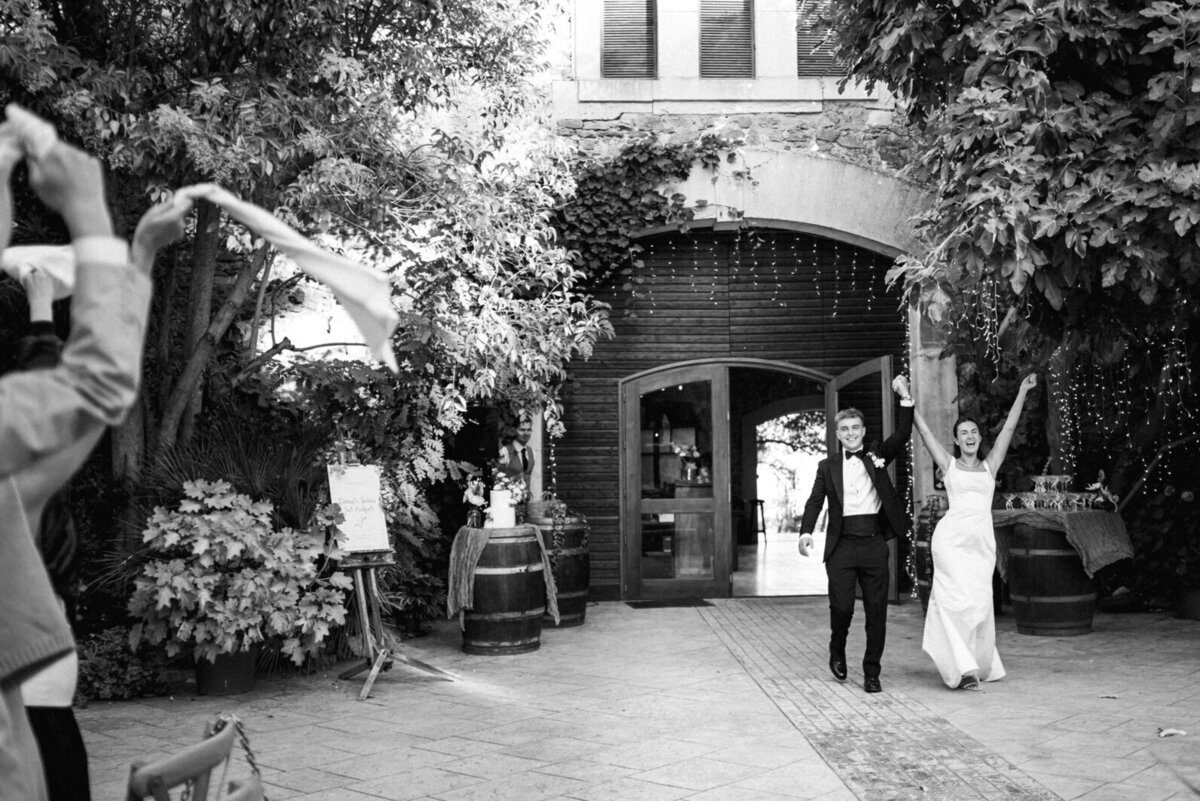 wedding-couple-arriving-courtyard-reception-france1