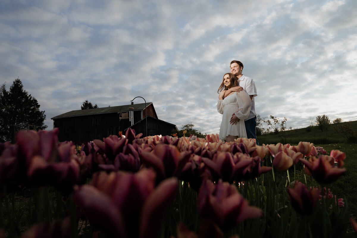 Engagement photo shot at a flower farm. Shot by Sanaa Studio - Toronto Wedding Photographer 